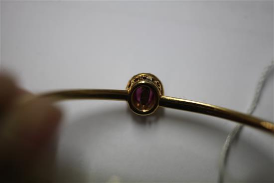A Victorian gold, ruby and diamond cluster hinged bangle,